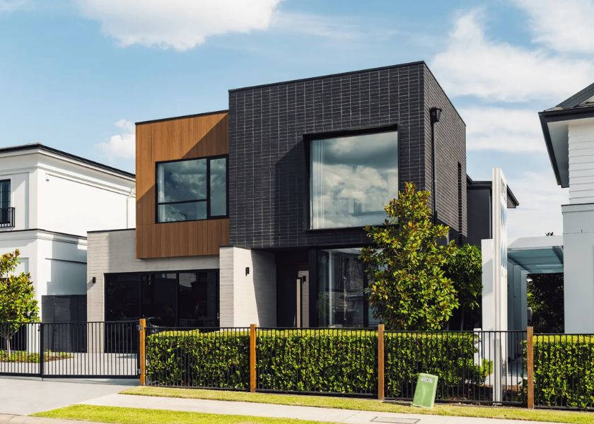Rumah Minimalis 2 Lantai Kotak Geometris dengan Sentuhan Kayu
